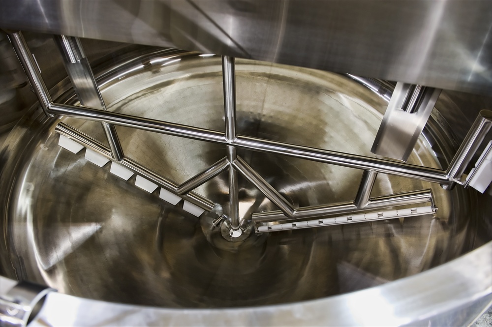 This photo shows the inside of one of HOLLOWAY's stainless steel mixing tanks, perfect for food processes.