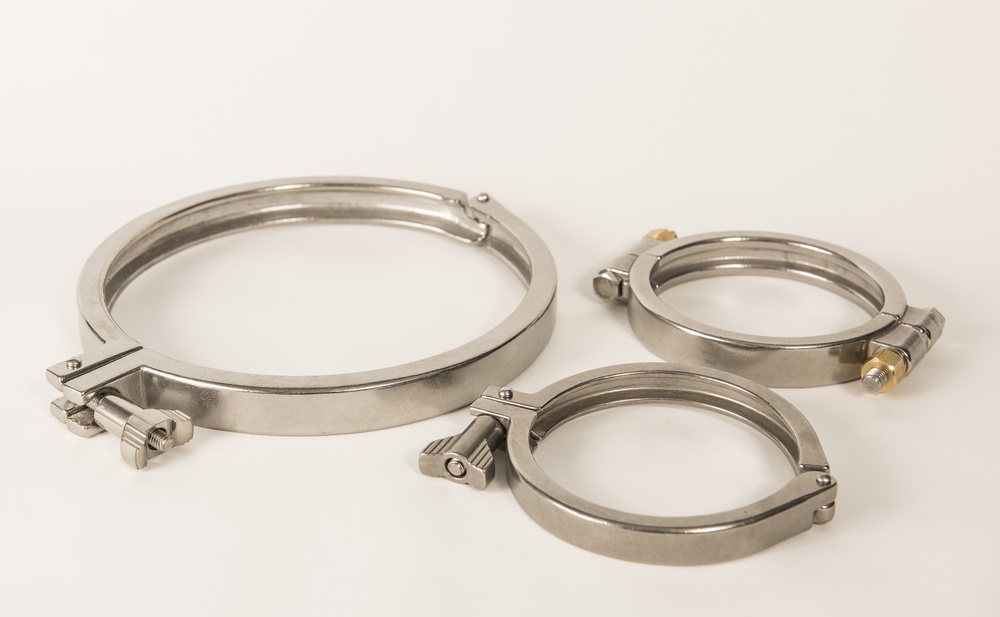 Among the pressure vessel parts for Precision Stainless tanks are these clamps.