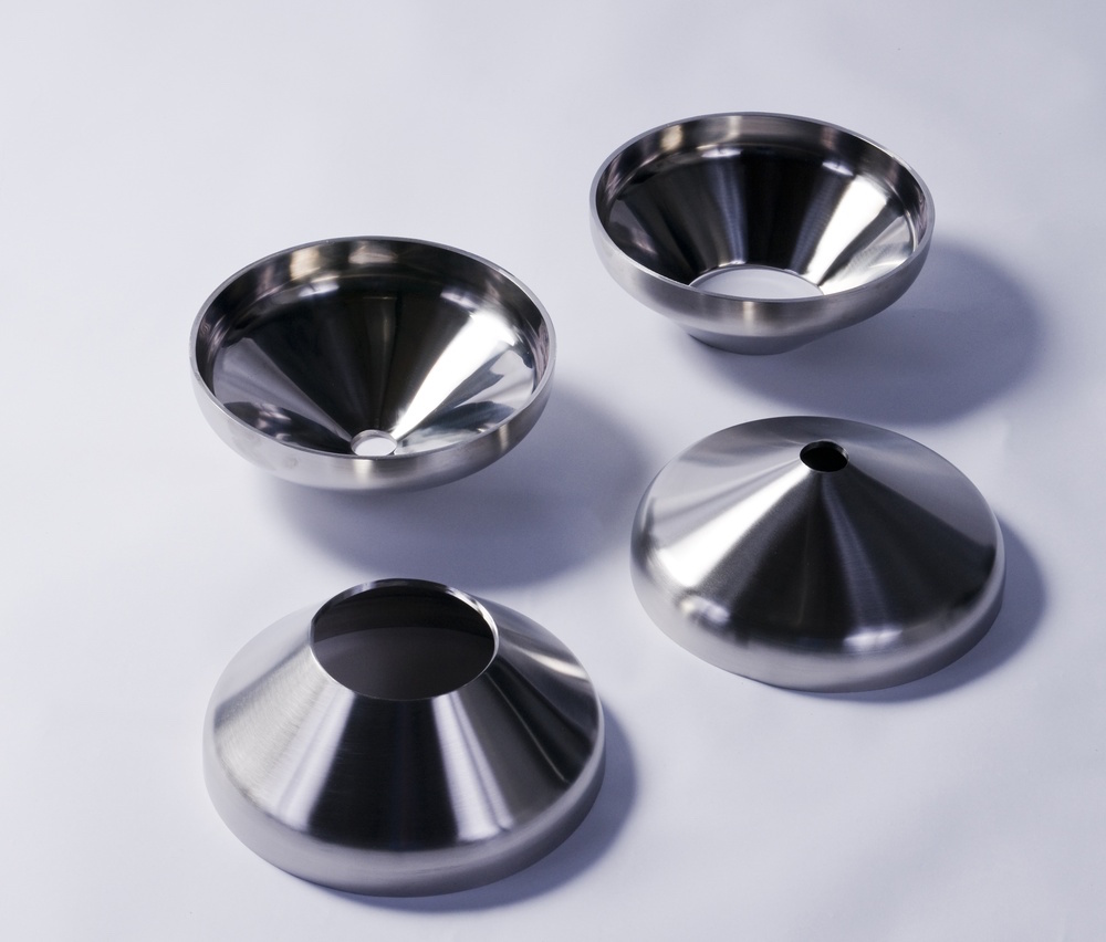 A leader in stainless steel tank heads, Holloway crafts toriconical heads like these.